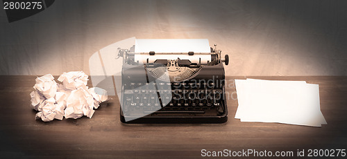 Image of Vintage typewriter and old books