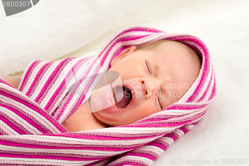 Image of crying newborn baby in the hospital