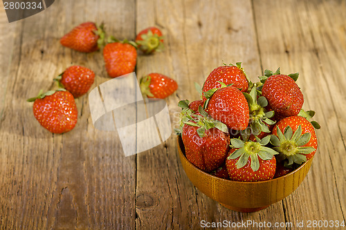 Image of Fresh strawberries in wood bowl 