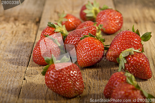 Image of Close up of strawberries on wood