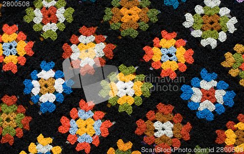 Image of Retro homemade crochet blanket made from Granny Squares