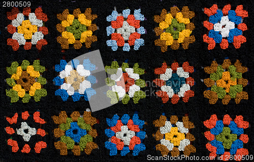 Image of Retro homemade crochet blanket made from Granny Squares