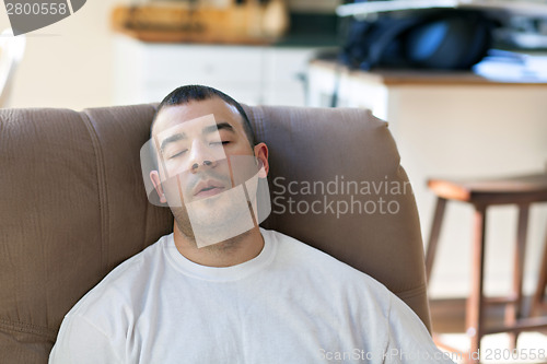 Image of Lazy Man Sleeping on the Sofa