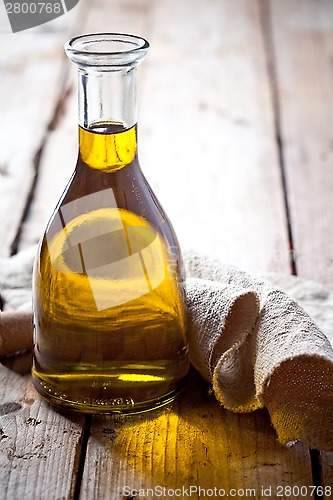 Image of fresh olive oil in bottle 