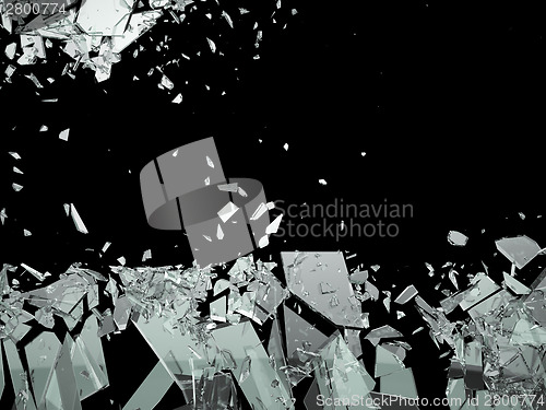 Image of Pieces of Broken or Shattered glass isolated on black