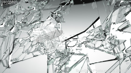 Image of Sharp Pieces of shattered glass isolated on white