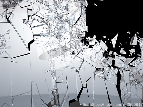 Image of Pieces of Shattered glass on black background