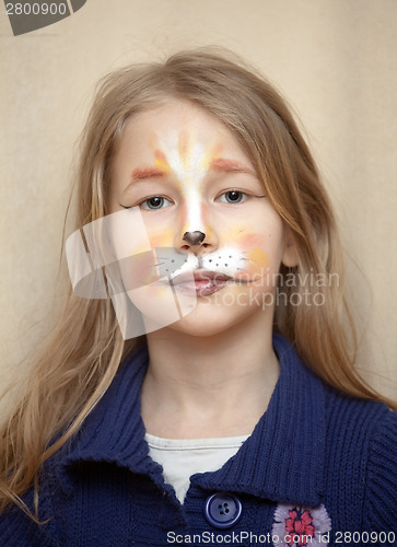 Image of portrait of little girl with cat painting makeup