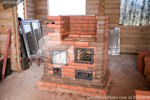 Image of half unfinished brick stove