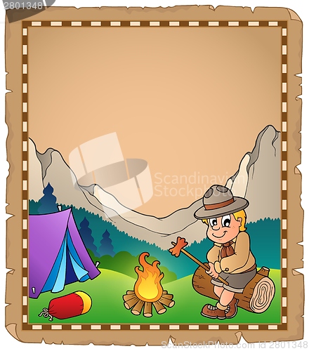 Image of Parchment with scout by campfire