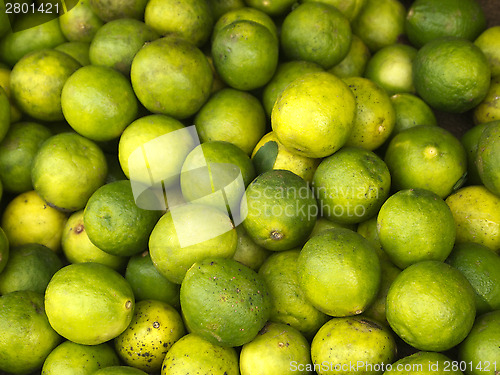 Image of Green limes on the market