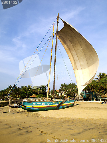 Image of Sailing ship at the beach