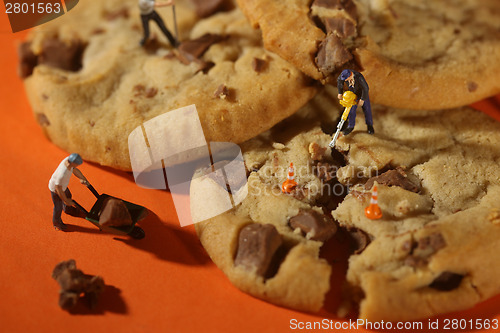 Image of  Plastic People Working on Chocolate Chip Cookies