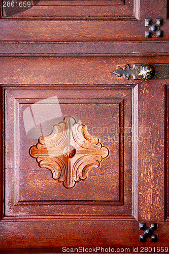 Image of spain knocker lanzarote  door wood in the red brown 