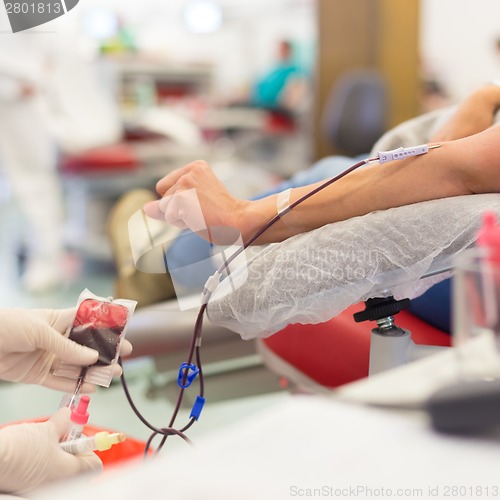 Image of Nurse and blood donor at donation.