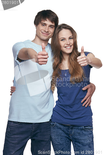 Image of Happy couple with thumbs up
