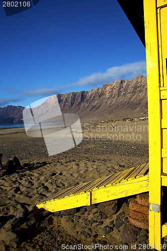 Image of lifeguard chair cabin lanzarote sky   coastline and summer 