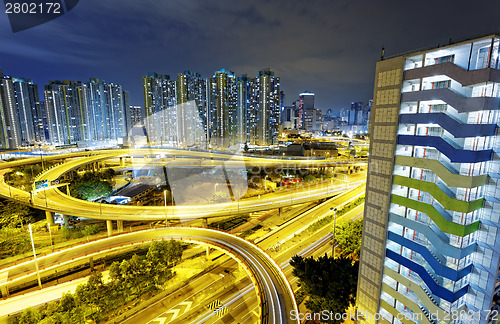 Image of busy traffic night in finance urban