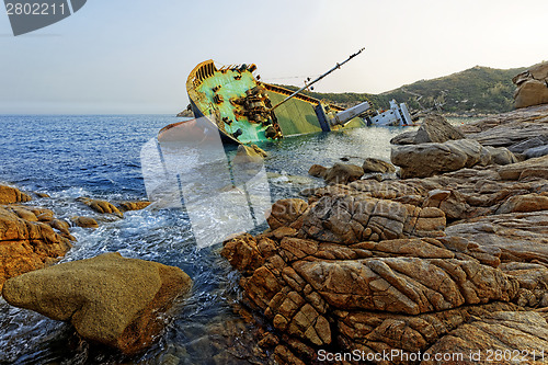 Image of shipwreck and seascape sunset 