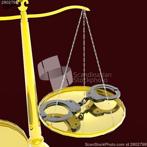 Image of Scales of justice and handcuffs