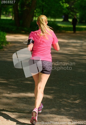 Image of Female jogger in   park