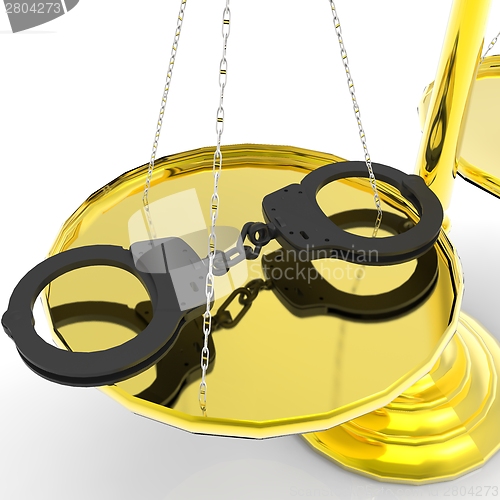 Image of Scales of justice and handcuffs