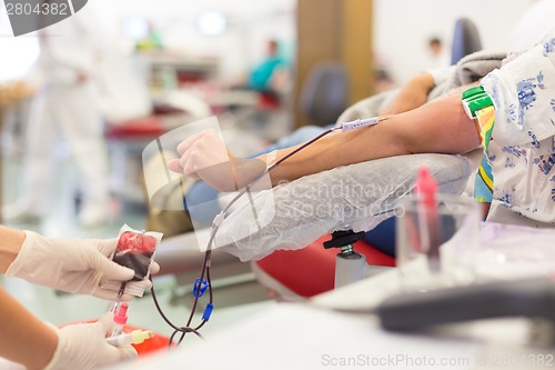 Image of Nurse and blood donor at donation.