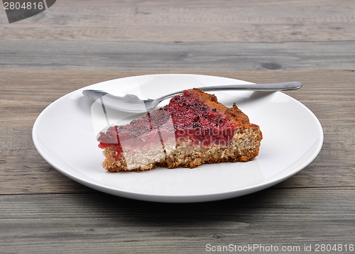 Image of Red currant cake on wood