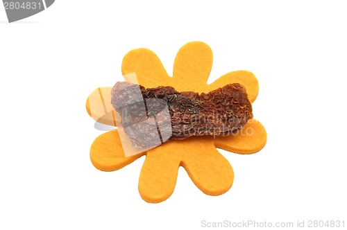 Image of Dried tomatoes and felt decoration