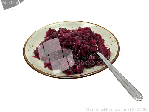 Image of Cooked red cabbage arranged on a plate with fork