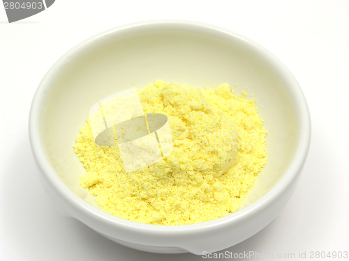 Image of Cornmeal  in a bowl of chinaware on white background