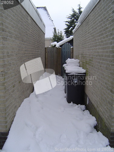 Image of Side Garage covered in Snow.