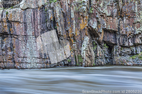 Image of rock cliff and whitewater river