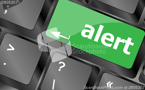 Image of Computer keyboard with attention key alert - business background