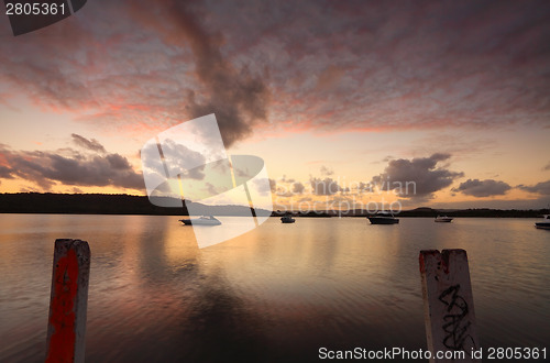 Image of Relaxing on the jetty watching the beautiful sunset