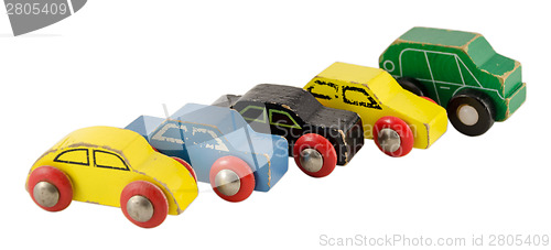 Image of wood miniature colorful car toy isolated on white  