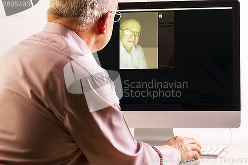 Image of Man at Computer