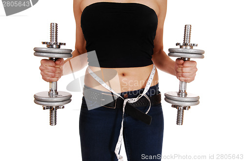 Image of Woman with dumbbell's.