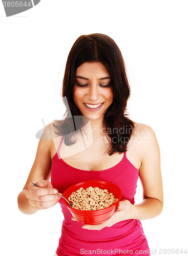 Image of Woman eating serial.