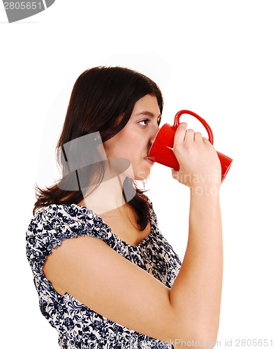 Image of Woman drinking coffee.