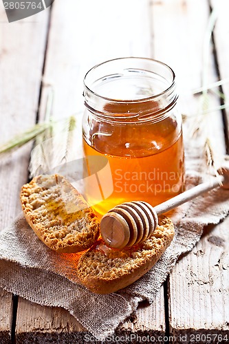 Image of crackers and honey