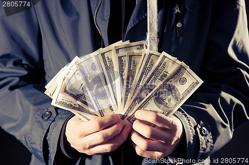 Image of Cash in hand