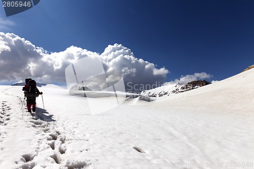 Image of Two hikers on snowy plateau