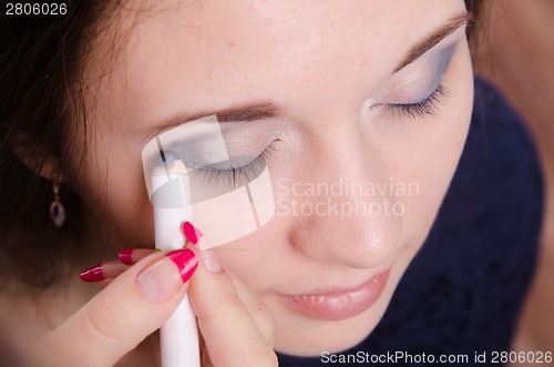 Image of Makeup artist brush eyelash tints model