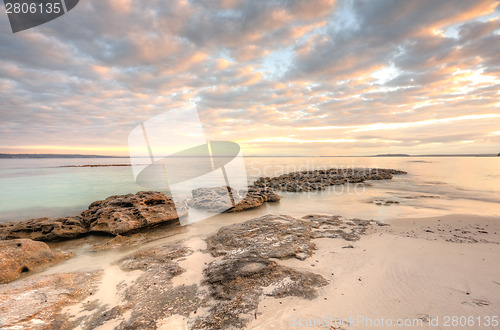 Image of Pretty dappled sunrise sky in the morning at Scottish Rocks, Aus