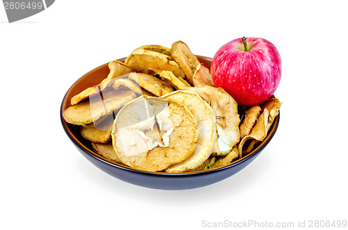 Image of Apple fresh red and slices of dried in bowl