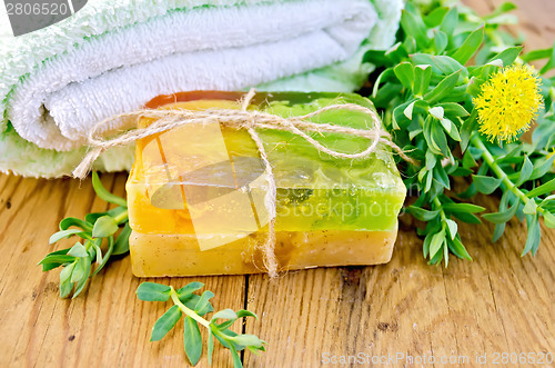 Image of Soap homemade with Rhodiola rosea on board