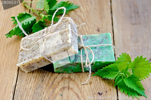 Image of Soap homemade with nettle on the board