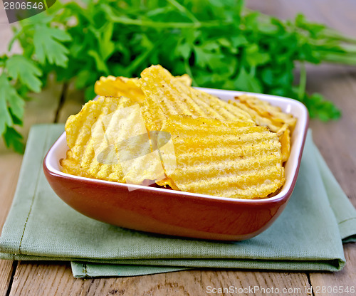 Image of Chips grooved in bowl on board