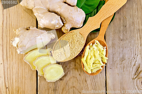 Image of Ginger powder and grated in spoon with root on board